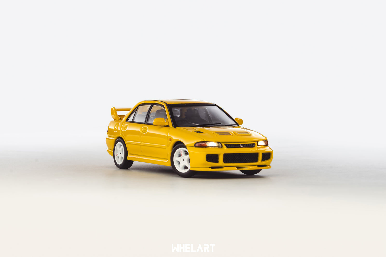 1:64 MITSUBISHI Lancer Evolution 3 Yellow