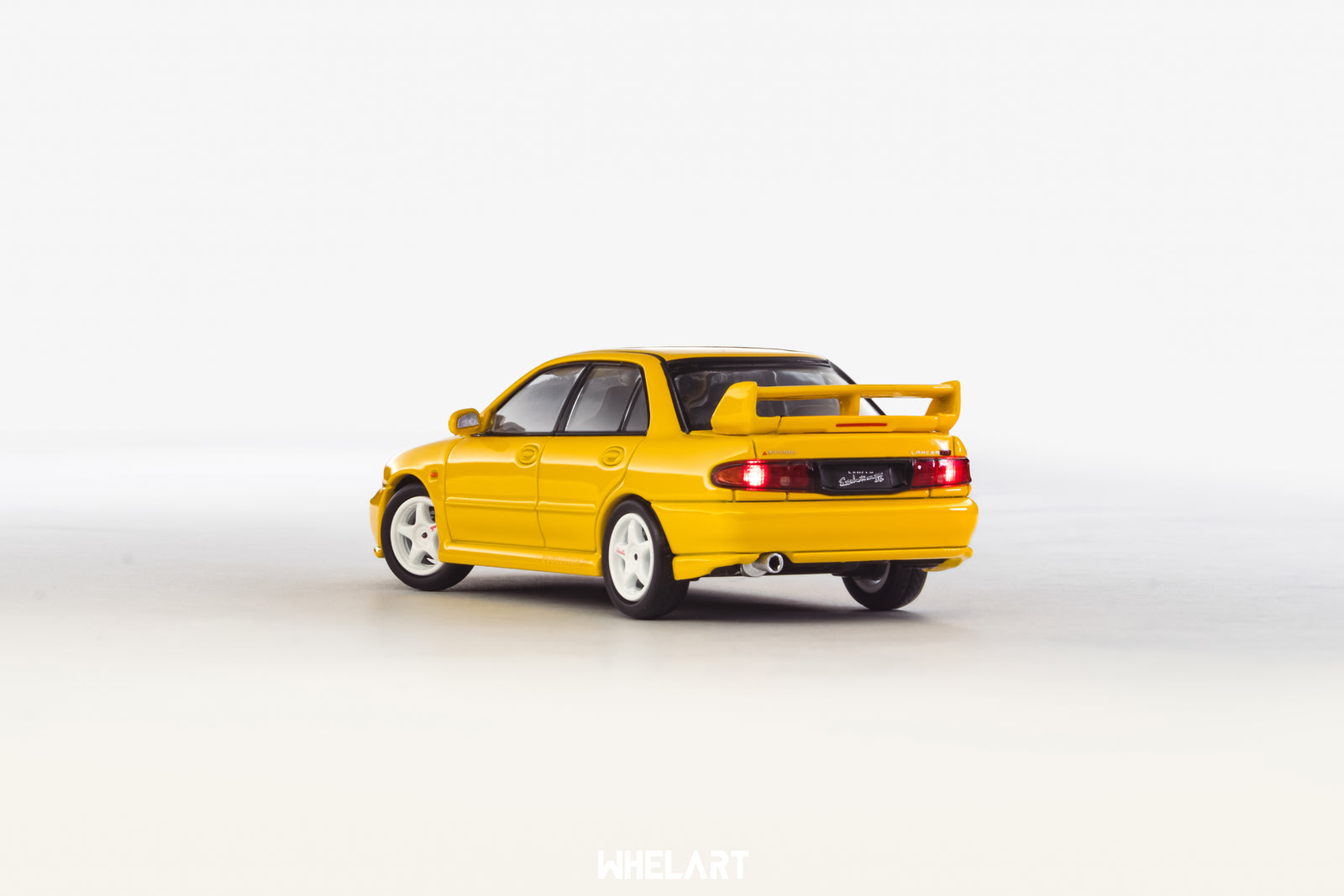 1:64 MITSUBISHI Lancer Evolution 3 Yellow